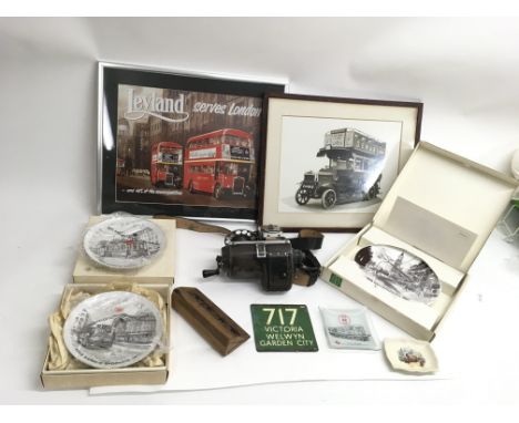A collection of bus transport memorabilia including a conductorÕs ticket machine, metal name plate and ticket rack
