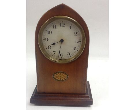 An Edwardian mahogany mantel clock.