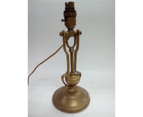 An early 20th Century brass lamp with humble type shaft, possibly from a ship.