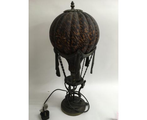 A Maitland Smith designed tortoiseshell effect glass balloon lamp, approx 61cm.