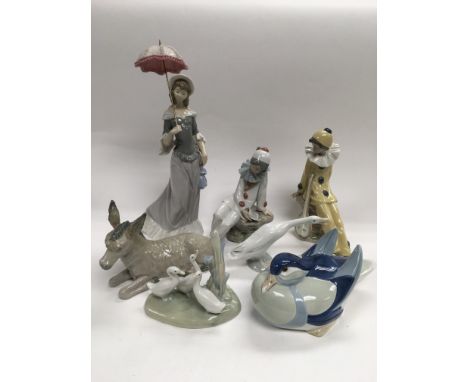 A collection of Lladro and Nao figures (7).