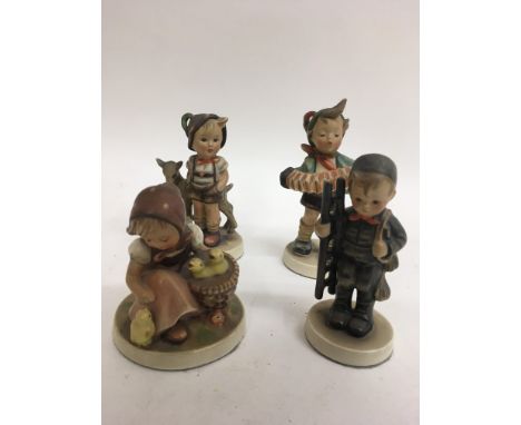 Four Hummel figures