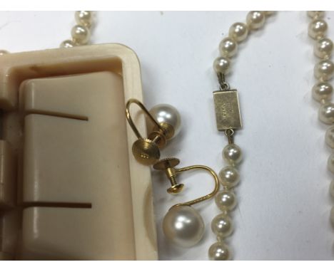 9ct gold and pearl earrings and pearl necklace with 9ct clasp.marker mark Ciro of bond st london and new York.oringal box