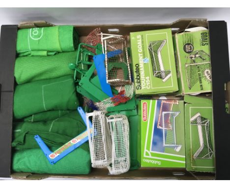 A quantity of subbuteo spares and accessories including spare parts for striker game.