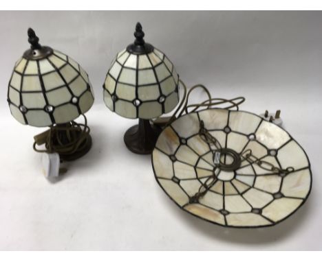 Two lead light lamps and a lampshade.