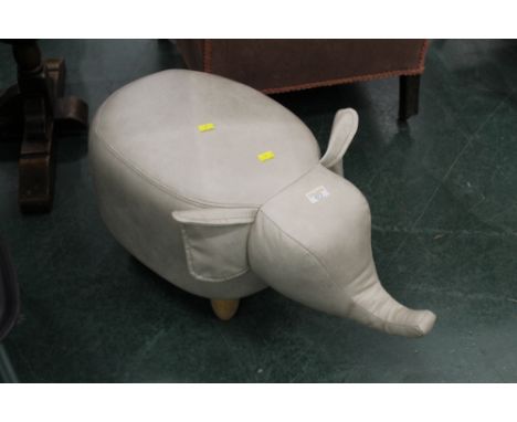 Elephant form footstool raised on wooden turned legs, height 35 cm, trunk to tail +/- 69 cm