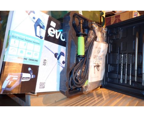 Boxed Evolution electric drill  CONDITION REPORT: All electrical items in this lot have been PAT tested for safety and have p