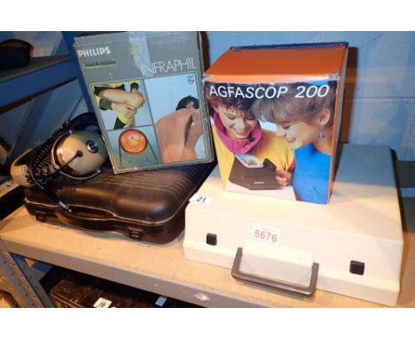 Mixed items including a typewriter headphones portable gas stove etc 