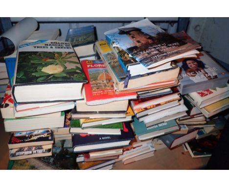 Shelf of mixed books hardback and paperback 