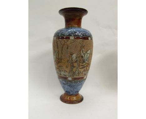 A Royal Doulton Hannah Barlow vase decorated in scraffito with stag hunting scene. Firing crack to base, 44.5cm tall 