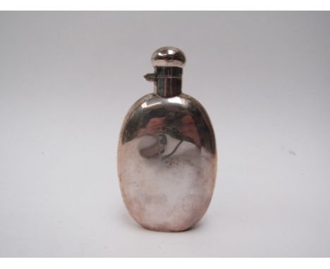 A silver hip flask, makers mark T.W. Birmingham 1918, marks rubbed, 12cm tall, 90g 