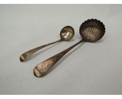 A William Bateman II silver ladle with shell form bowl lion crest detail, London 1836 and small sauce ladle by George Smith &