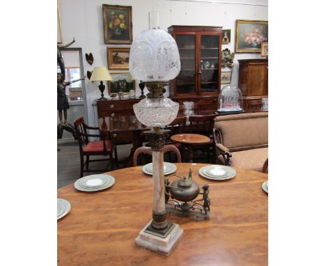 A gilt brass and onyx column form oil lamp, cut glass reservoir, Hinks No. 2 Duplex burner with floral etched/moulded glass s