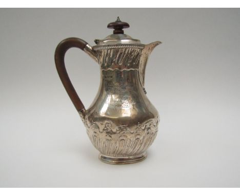A late Victorian silver coffee pot, dented and inscribed "Army Athletic Meeting 1899 Foil v Foil 1st Prize Captain H.P. Leade