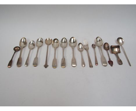 A box containing eight silver teaspoons, tea caddy spoon, souvenir spoon, condiment spoons and small fork, various makers and