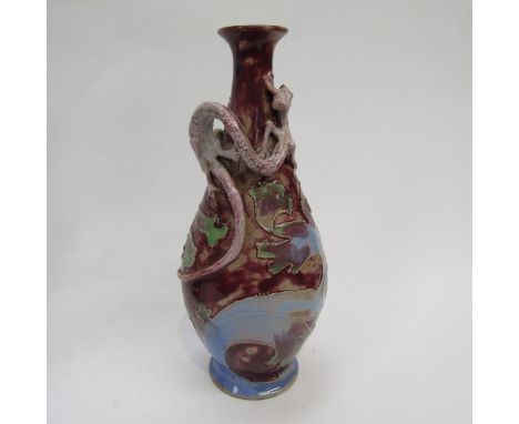 A Royal Doulton Mark V Marshall vase decorated with a pink dragon in high relief on a pink/blue ground, 22cm tall 