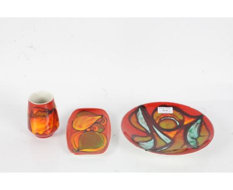 Three pieces of Poole pottery Delphis, comprising a vase 9cm, rectangular dish (18cm) and shallow bowl (20cm diameter) (3)