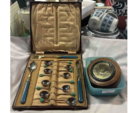 A circular forty year perpetual calendar, a cased set of antique coffee spoons, three brass bottle openers and a nutcracker, 