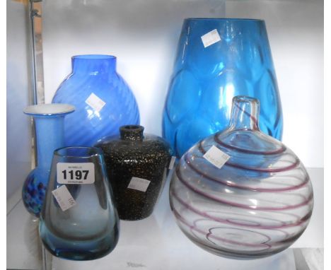 A quantity of coloured glassware including blue vases, Whitefriars 'flattened' vase in the pewter colourway, etc.