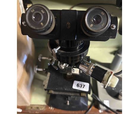 A vintage Cooke, Troughton &amp; Sims binocular microscope with black japanned finish