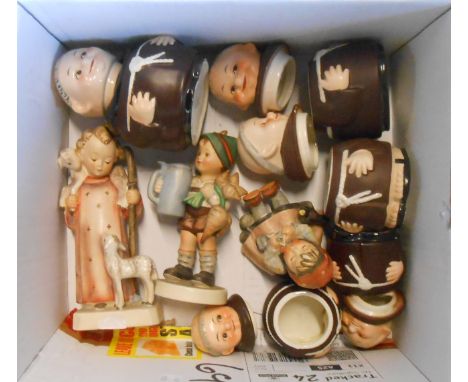 A box containing a quantity of Goebel ceramics including Hummel figures, monks, etc.