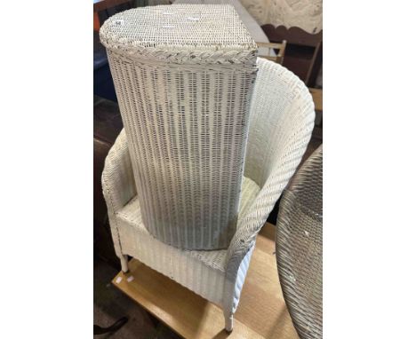 A vintage Lloyd Loom demi-lune laundry basket with white painted finish - sold with a similar tub chair