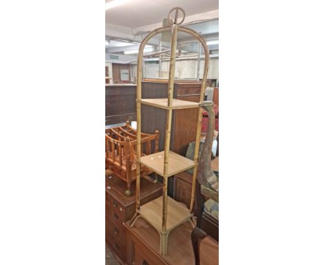 A 31cm modern bamboo three tier plant stand, set on splayed legs