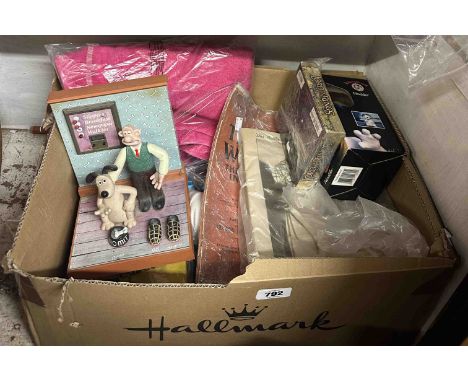 A box containing a quantity of assorted items including The Transvaal War Album, a Wallace &amp; Gromit nodding figure, two L