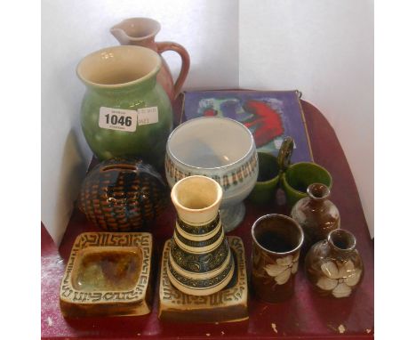A quantity of Craft and other pottery items including Ewenny vase and jug, Purbeck Pottery pin dishes, tile teapot stand with