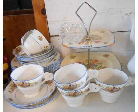 A Radfords bone china part tea set with moulded floral handles and transfer printed floral decoration comprising six trios - 