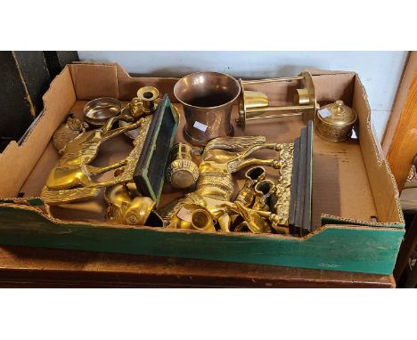 A box containing a quantity of brassware including a pair of large horse form mantel flatbacks, Indian pepper grinder, etc.