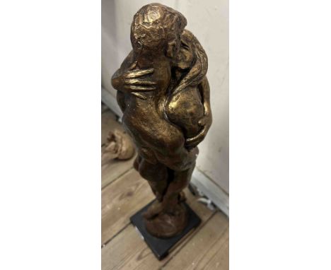 A large Austin bronze effect resin sculpture entitled 'Body and Soul', depicting two lovers entwined