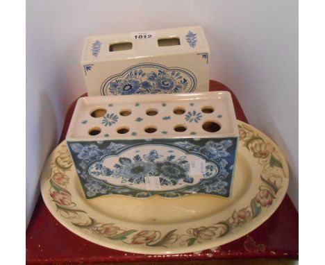 Two vintage Dutch Delft flowerbricks with typical blue painted decoration - sold with a Susie Cooper pottery small meat plate