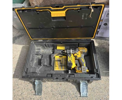 A cased DeWalt DCD796 18V drill - sold with a DeWalt 305mm saw blade
