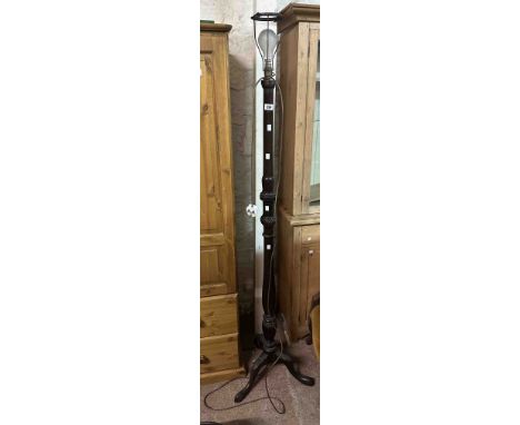 A 19th Century carved and stained mahogany torchère with turned pillar, set on tripod base - converted to standard lamp