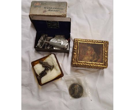 A small gilt wood trinket box with painted image to lid depicting a pair of lovers, a pair of miniature brass candlesticks, a