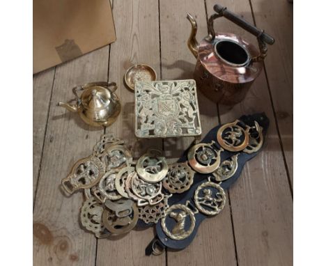 A box containing a quantity of metalware including horse brasses, etc.