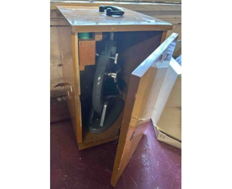 A vintage Chinese made microscope in wooden case - case a/f