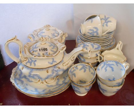 A 19th Century Worcester porcelain part tea set, decorated in the 'Coral' pattern comprising teapot, sucrier, milk jug, ten c