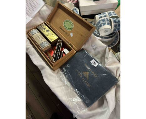 A cigar box containing a silver propelling pencil and two others, two old ink pens (one a/f), two vintage penknives, a cased 