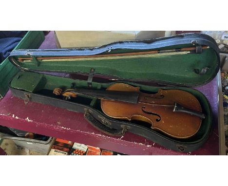 An old 1/2 size violin and bow in hard case