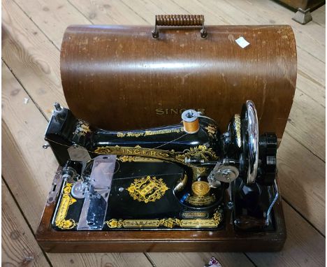 A cased Singer sewing machine