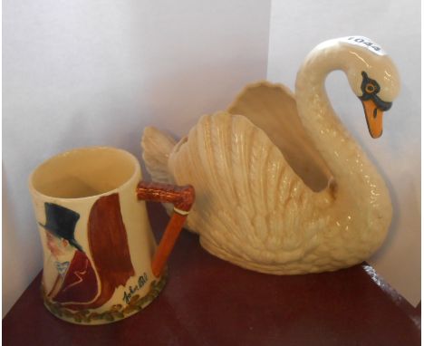 A Dartmouth Pottery swan planter with painted detailing - sold with a Crown Devon John Peel musical mug