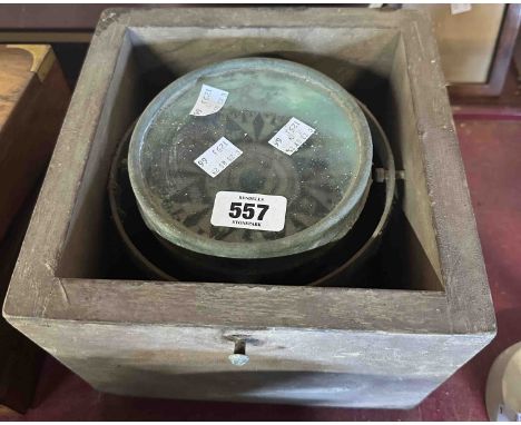 A ship's gimbal compass by Barker &amp; Son of London, set in a wooden case