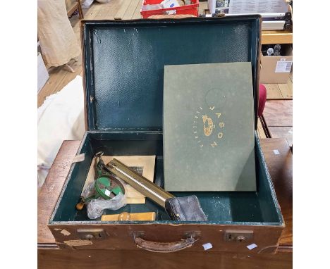 A vintage suitcase containing a Spong bean slicer, a R.E. Polden sugar thermometer and a cased set of binoculars from Lennie 