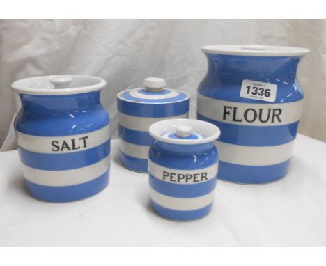 A quantity of T.G. Green Cornish Ware items comprising a large 'Flour' storage jar with black lettering, a smaller similar wi