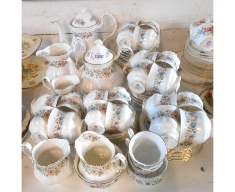 A quantity of Paragon bone china tableware decorated in the 'Meadowvale' pattern including teapot, coffee pot, teacup, coffee