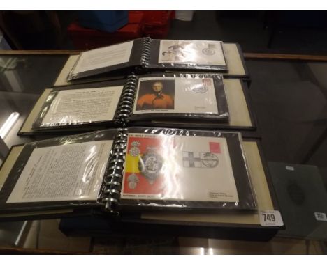 THREE FOLDERS OF FIRST DAY COVERS