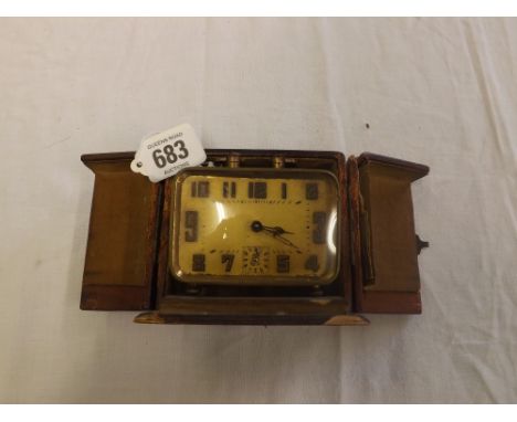 A VINTAGE BREVETE SGDG CLOCK IN CARRY CASE
