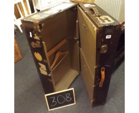 A GOOD QUALITY BOUND TRAVELLING TRUNK BY WATAJOY (WITH HARRODS LABEL &amp; TRAVEL LABELS) LOCK A/F
